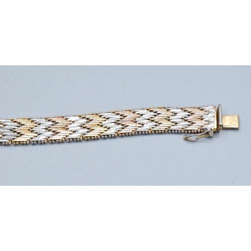 14 - Two colour silver and gilt chevron weave mesh bracelet 19cm long 1.0cm wide&nbsp;
