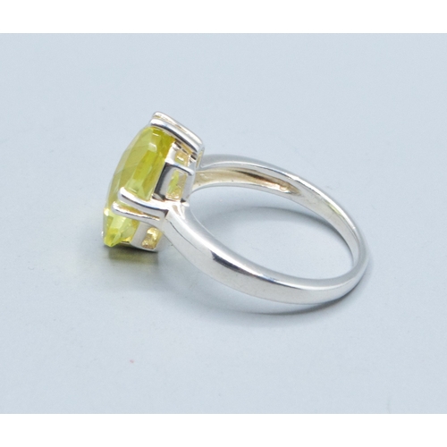 27 - 925 silver ladies facetted single stone lemon Quarts dress ring held in a claw design 16x12mm stone,... 