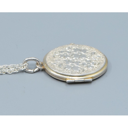 221 - 925 silver locket and 925 new silver neck chain togetehr with a Pandora ALE bracelet and another sil... 