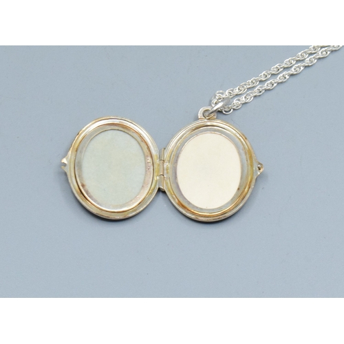 221 - 925 silver locket and 925 new silver neck chain togetehr with a Pandora ALE bracelet and another sil... 