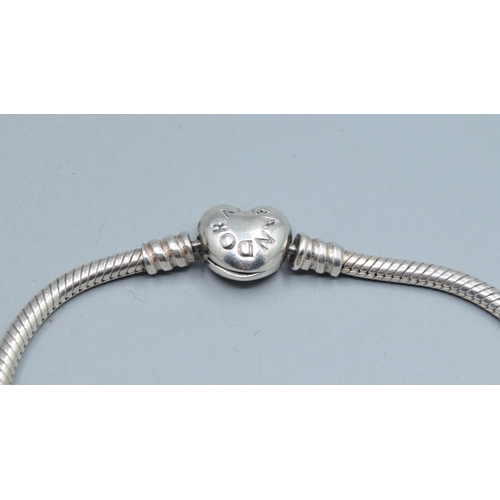 221 - 925 silver locket and 925 new silver neck chain togetehr with a Pandora ALE bracelet and another sil... 