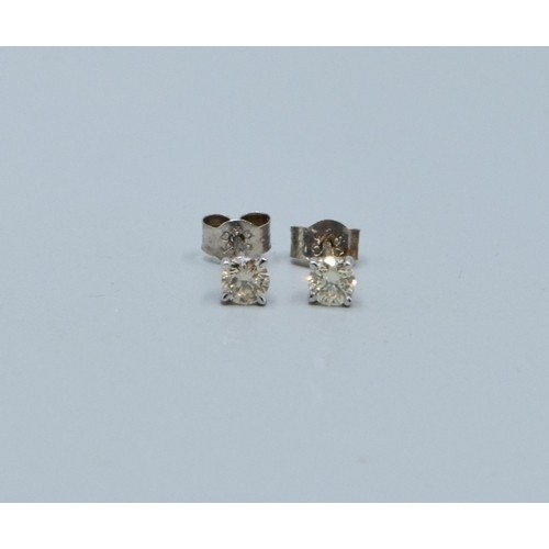 277 - Pair of 14ct white gold Diamond stud earrings of 40 points total weight