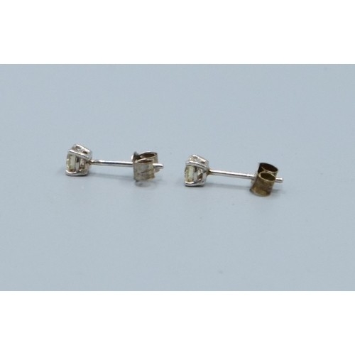 277 - Pair of 14ct white gold Diamond stud earrings of 40 points total weight