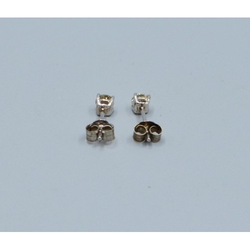 277 - Pair of 14ct white gold Diamond stud earrings of 40 points total weight