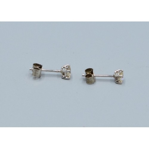 277 - Pair of 14ct white gold Diamond stud earrings of 40 points total weight