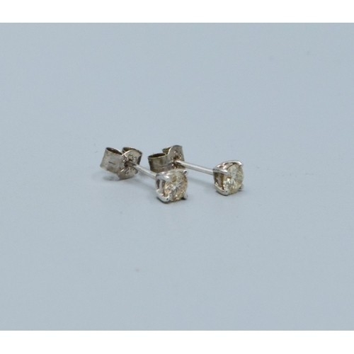 277 - Pair of 14ct white gold Diamond stud earrings of 40 points total weight
