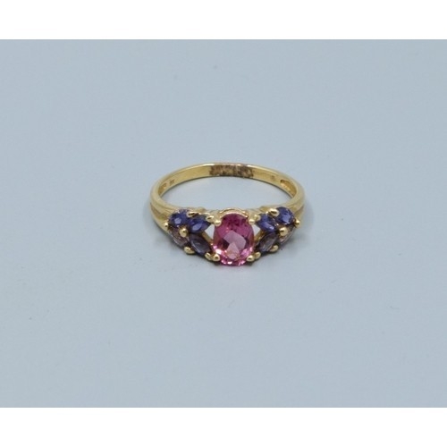 278 - 9ct gold ladies dress ring set with central Amethyst size N