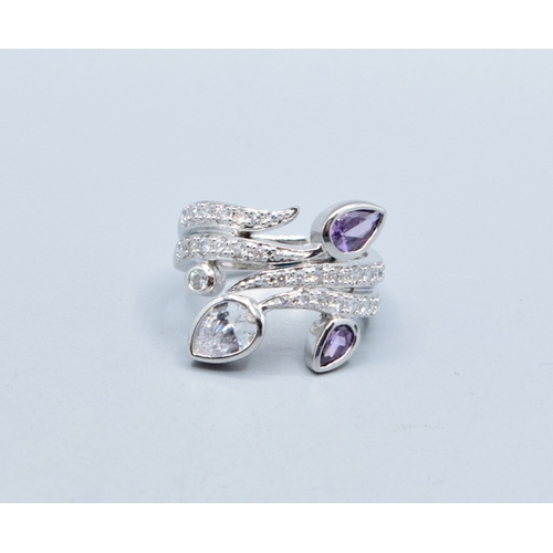 255 - 925 silver ladies contemporary design scrolling bud design ring set with Amethyst and clear gem ston... 