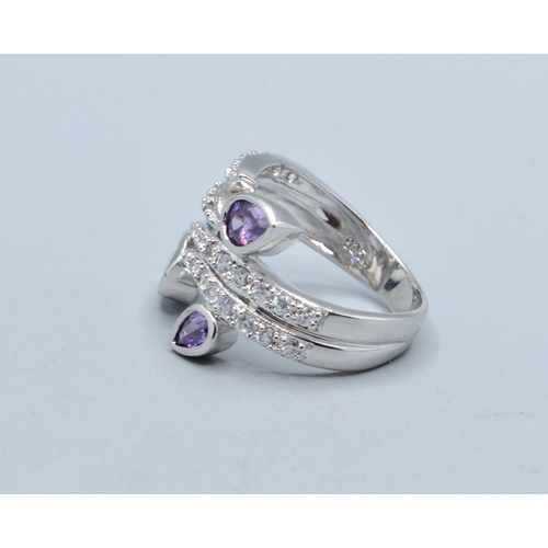 255 - 925 silver ladies contemporary design scrolling bud design ring set with Amethyst and clear gem ston... 