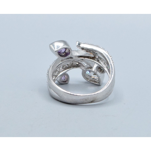 255 - 925 silver ladies contemporary design scrolling bud design ring set with Amethyst and clear gem ston... 
