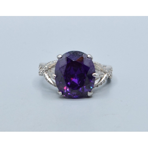 295 - 925 silver ladies Amethyst design single stone ring with a triple cross over setting size R
