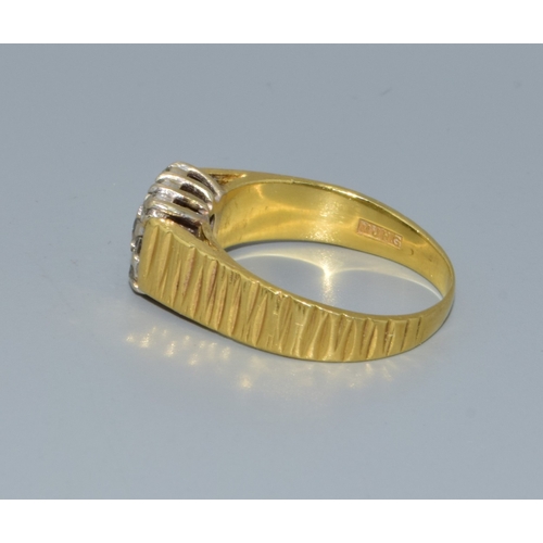 338 - 18ct gold Diamond square face ring being set with 9 Diamonds the central one slightly larger for eff... 