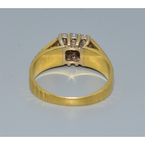 338 - 18ct gold Diamond square face ring being set with 9 Diamonds the central one slightly larger for eff... 