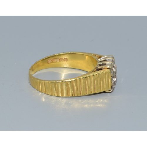 338 - 18ct gold Diamond square face ring being set with 9 Diamonds the central one slightly larger for eff... 