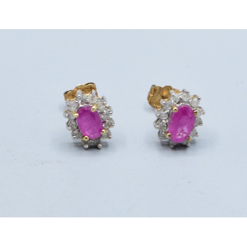 327 - 9ct gold ladies matching suite of Diamond and Ruby earrings and ring the ring is size N, 4.2grams