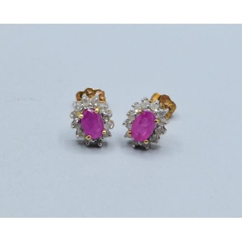 327 - 9ct gold ladies matching suite of Diamond and Ruby earrings and ring the ring is size N, 4.2grams
