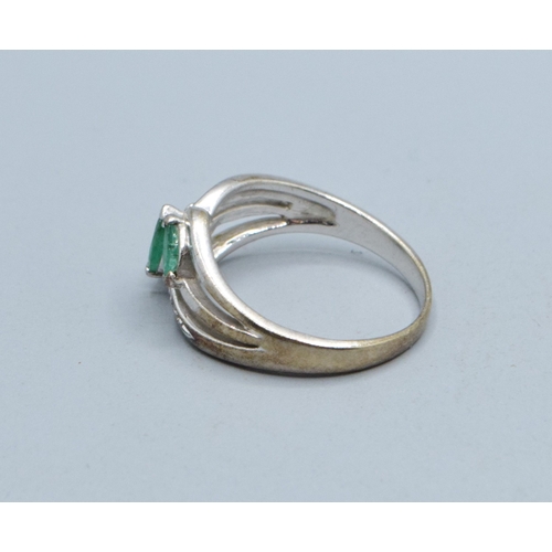 330 - 9ct white gold ladies Emerald and Diamond double sweep design ring size N, 3.4grams&nbsp;