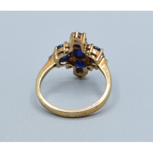 336 - 9ct gold Sapphire Diamond shape design ladies dress ring the head measures 19x14mm 3.5grams size N