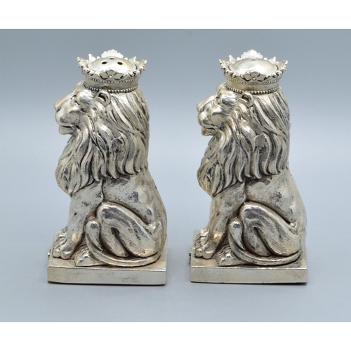 224 - Unusual pair of silver plate condiments in the shape of Lions on a Plinth 9cm tall