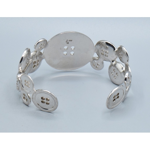 292 - Rare unusual heavy 925 silver solid Button bracelet 33mm at widest 18mm at narrowest 67grams&nbsp;