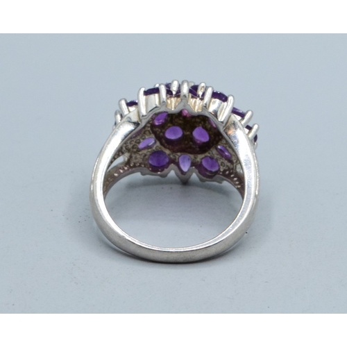240 - 925 silver ladies Raspberry Amethyst design ring with the head measuring 18mm diameter size P