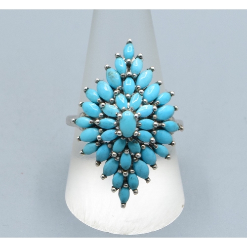 248 - Beautiful vintage Diamond shape Turquoise multi stone ring set in a 925 silver cage design the head ... 