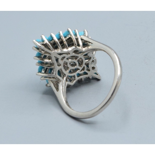 248 - Beautiful vintage Diamond shape Turquoise multi stone ring set in a 925 silver cage design the head ... 