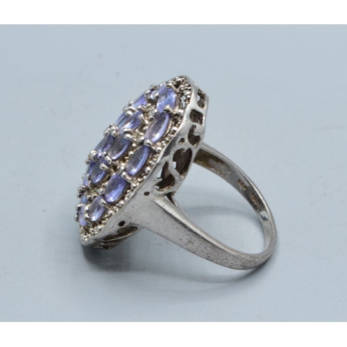 296 - Large oval Amethyst ladies statement ring set in an open work design in 925 silver the head size bei... 