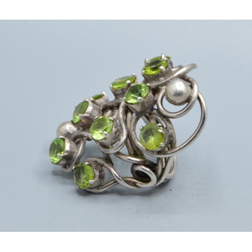 300 - Very large ladies Peridot multi stone statement ring held in an open design in 925 silver, the head ... 