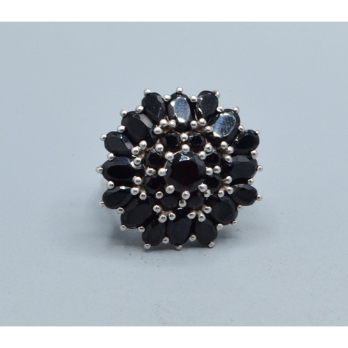 313 - 925 silver ladies Sapphire cluster statement ring held in a claw design the head being 25mm diameter... 