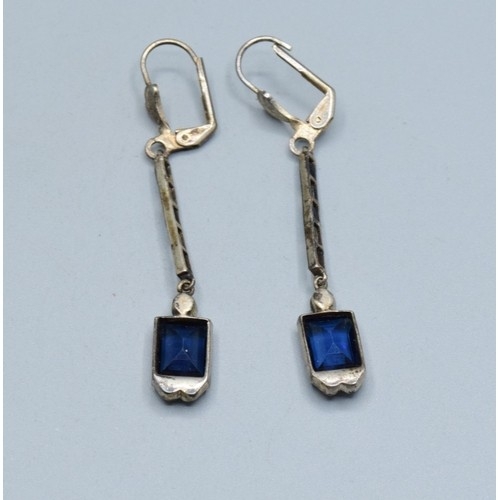 764 - Vintage sterling silver garnet line bracelet, together with a pair of art Deco drop paste earrings (... 