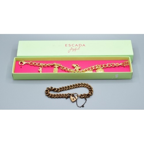 789 - Vintage original Escada boxed charm bracelet together with an old gold plated padlock bracelet weigh... 