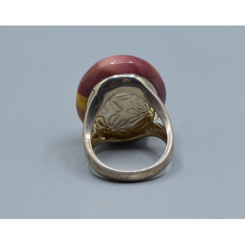 863 - 925 silver large oval Mookaite Jasper ladies dress ring with the single stone being 27x21x15mm held ... 