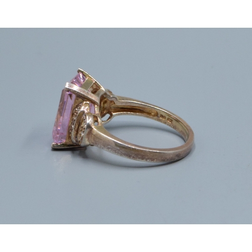 826 - 925 silver ladies Ametrine Quarts emerald cut rectangular clear stone decorated dress ring held in a... 