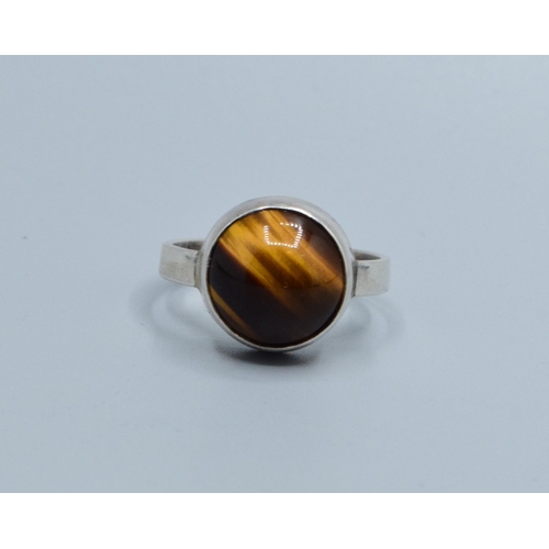 831 - 925 silver Tigers Eye solitaire ring held in an enclosed setting size M
