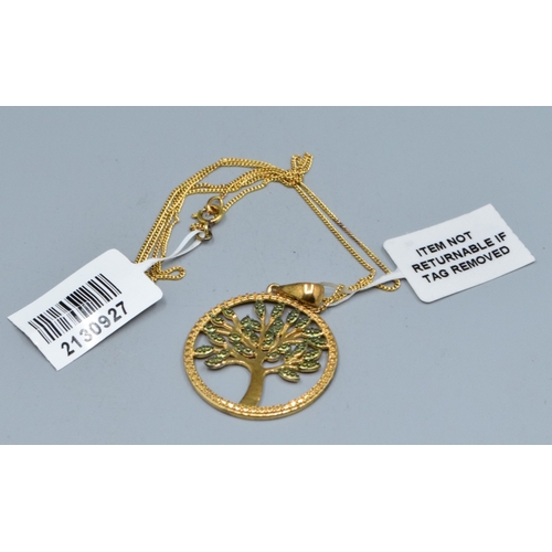 817 - New with Tag gold on 925 silver Tree of Life pendant necklace with green gem set decoration on a mat... 