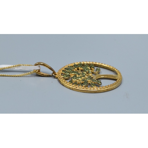817 - New with Tag gold on 925 silver Tree of Life pendant necklace with green gem set decoration on a mat... 