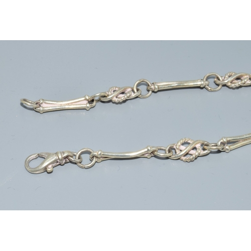 762 - 925 silver fancy link bracelet 19cm long together a pair of drop earrings and a ring