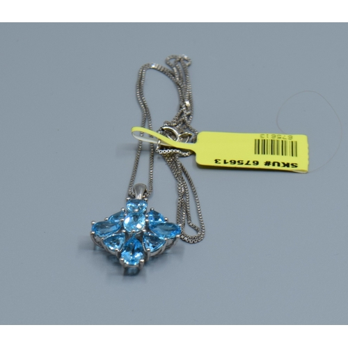 837 - New with Tag 925 silver ladies Blue topaz pendant neck lace in a diamond shape on a new 925 silver c... 