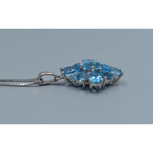 837 - New with Tag 925 silver ladies Blue topaz pendant neck lace in a diamond shape on a new 925 silver c... 