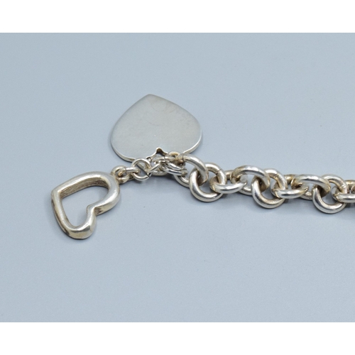 814 - 925 silver ladies double heart bracelet with the arrow clasp 18cm long 39grams