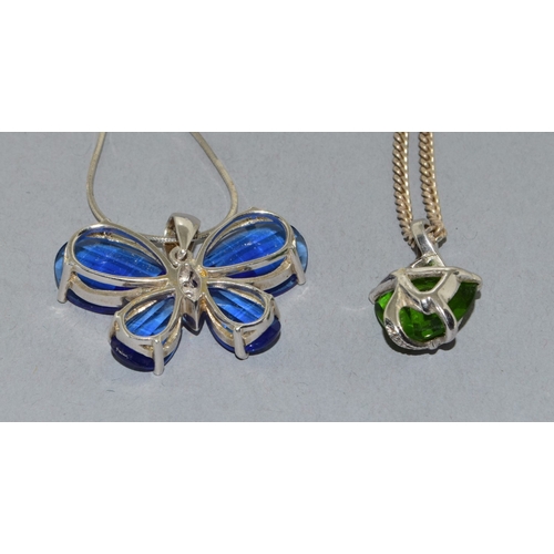 864 - 2 x 925 silver pendant necklaces a Butterfly pend and chain together with a green stone pendant and ... 