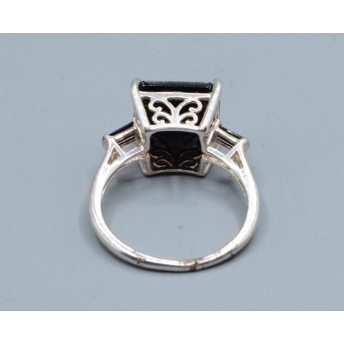 811 - 925 silver square shape black Agate ladies dress ring with the head measuring 11x11mm and held in a ... 