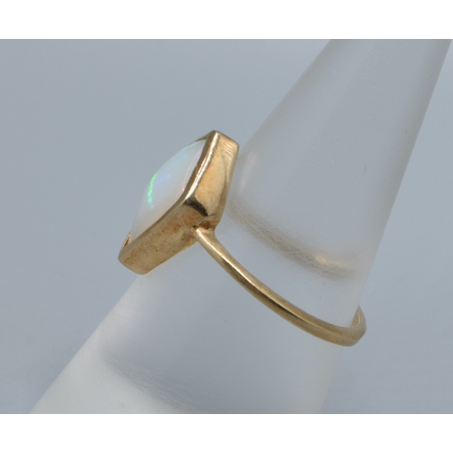 925 - 9ct gold ladies Diamond shape Opal single stone ring held in an enclosed design the mead measures 14... 