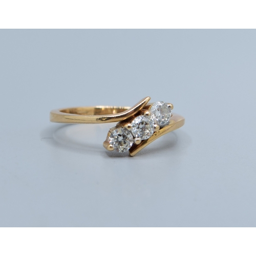 855 - 18ct gold (tested) ladies 3 stone Diamond ring in a twist setting estimated Diamond value 0.25cts si... 