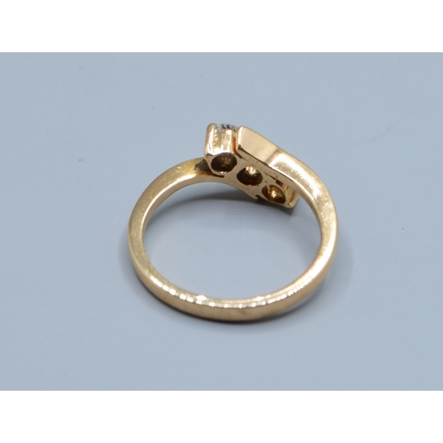 855 - 18ct gold (tested) ladies 3 stone Diamond ring in a twist setting estimated Diamond value 0.25cts si... 