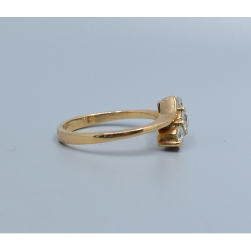 855 - 18ct gold (tested) ladies 3 stone Diamond ring in a twist setting estimated Diamond value 0.25cts si... 