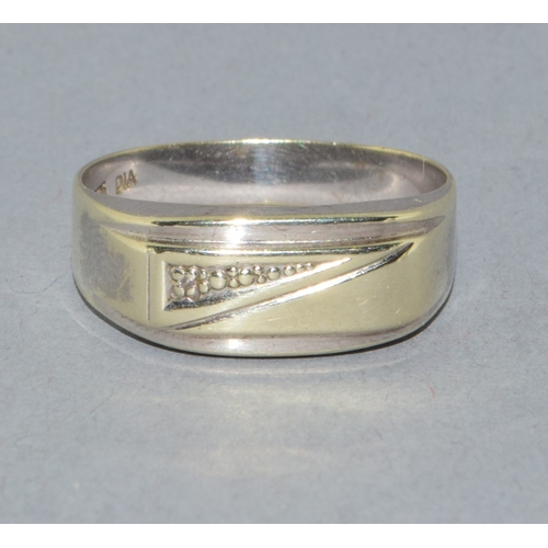 524 - 9ct white gold gents signet ring with accent Diamond marked as diamond in the ring size U. 3.0grams