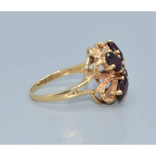 550 - 9ct gold ladies heavy vintage 4 leaf clover design Garnet cocktail ring in a claw open work setting ... 