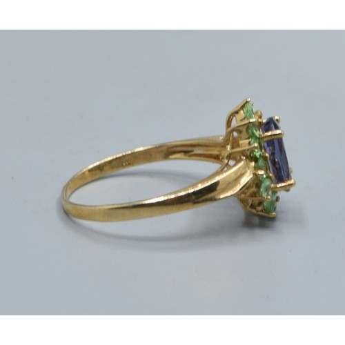 544 - 9ct gold ladies Amethyst and green Peridot halo design ring size N, 2.2grams